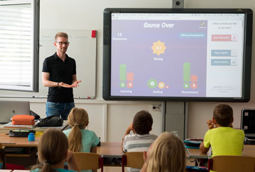 Teacher in a Classroom with Students